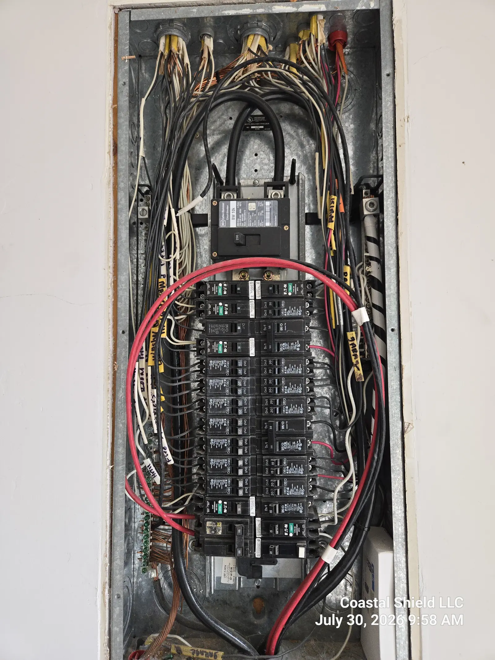 Main electrical panel with the dead-front removed during a Santa Barbara inspection — every circuit traced and checked